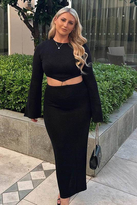 Conjunto de punto con cuello redondo y falda con abertura