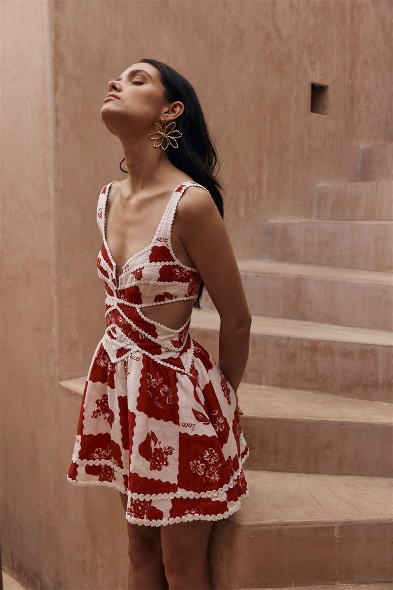 Vestido mini con aberturas y estampado Leila