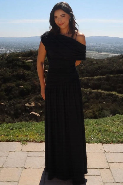 Vestido largo de noche con corte asimétrico