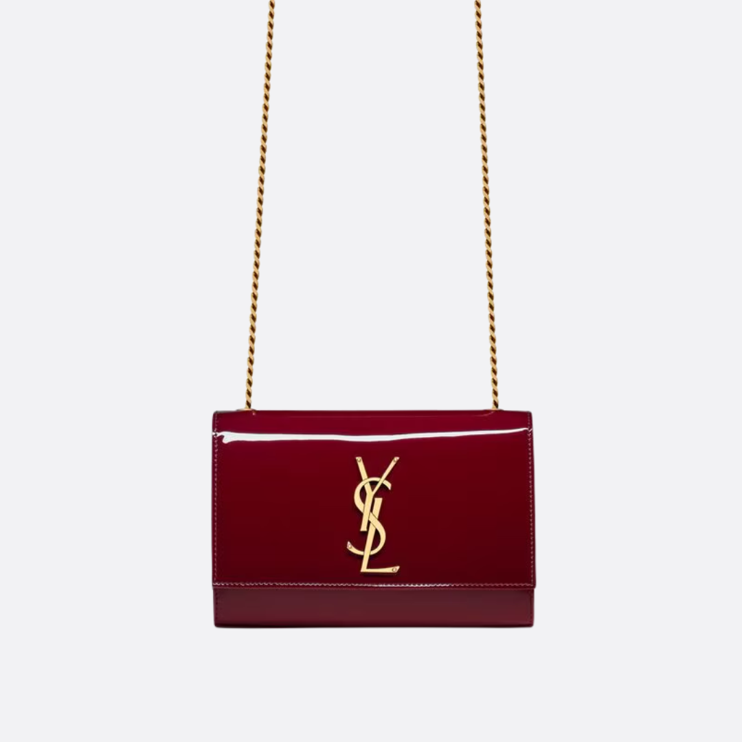 Petit sac SL Kate porté à l’épaule en cuir verni