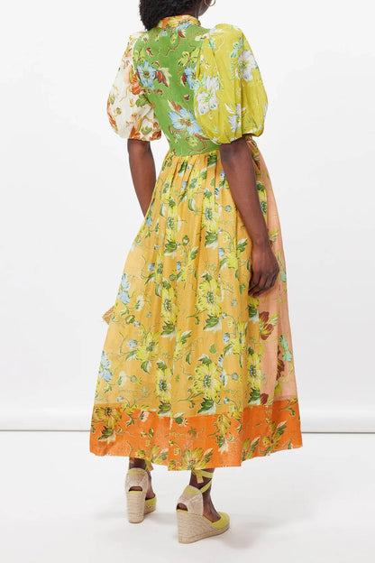 Vestido midi con mangas abullonadas y diseño floral