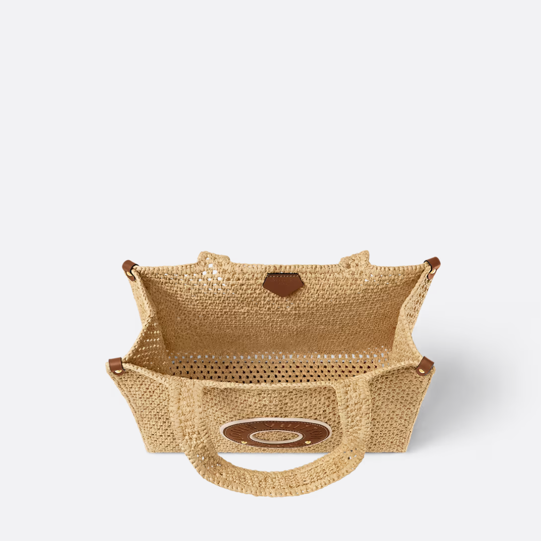 Borsa a mano LV Onthego Mm in rafia by the pool