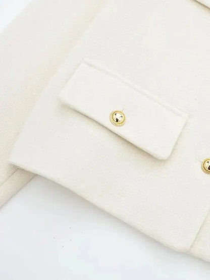 Chaqueta con botones dorados