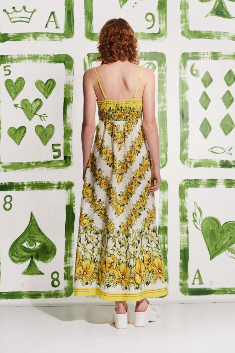 Vestido largo amarillo con estampado floral de espagueti de Tristane