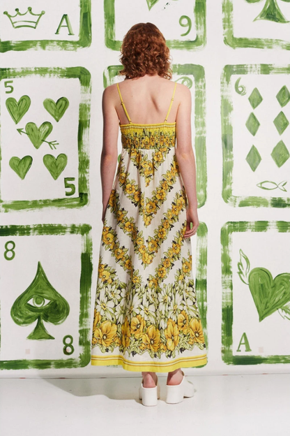 Vestido largo amarillo con estampado floral de espagueti de Tristane