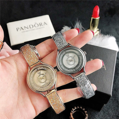 P A N D O R A Mirela