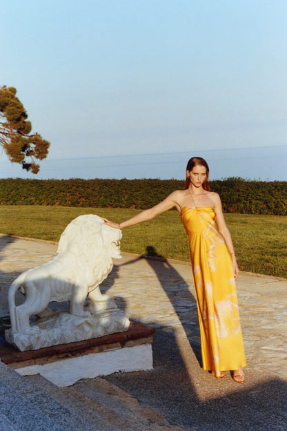 Vestido largo de satén estampado amarillo