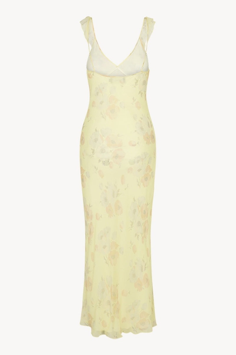 Vestido largo ajustado con cuello pronunciado y volantes con lazo y estampado floral