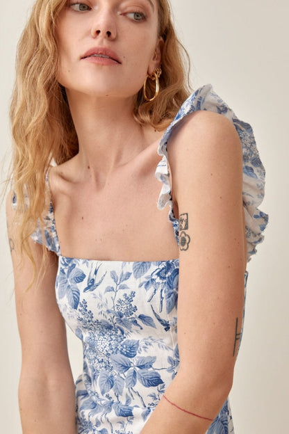 Vestido midi con abertura y tirantes con volantes estampados de Joa